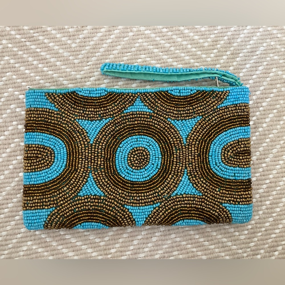 Gold and turquoise wristlet.